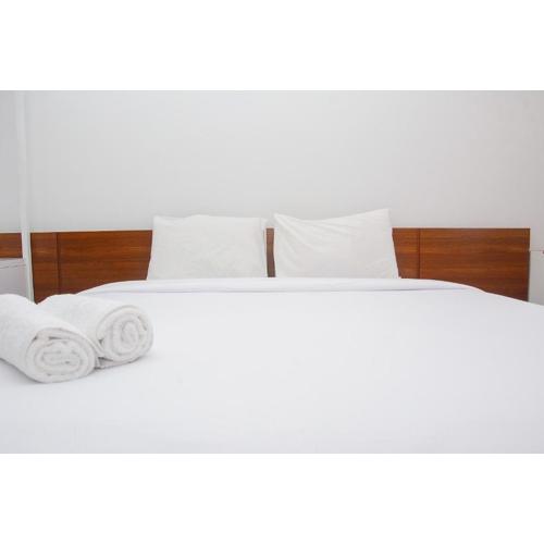 Comfy Studio Room at Patraland Urbano Apartment By Travelio