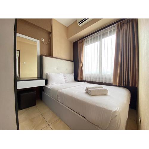 Comfy & Well Appointed 2BR at Tamansari Panoramic Apartment By Travelio