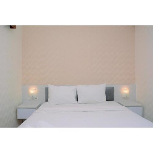 Comfy with Modern Style 1BR Grand Kamala Lagoon Apartment By Travelio