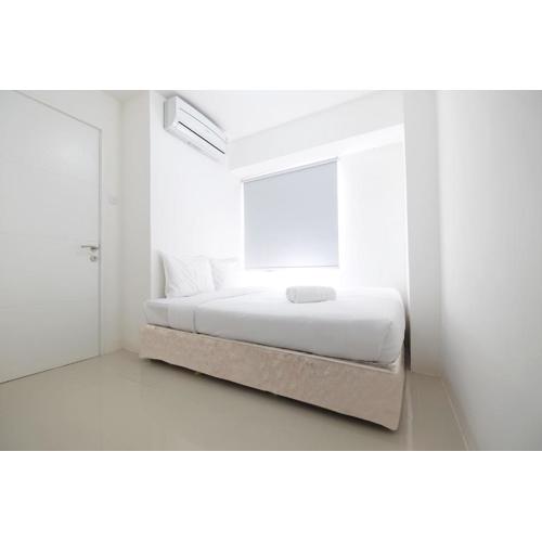 Compact 2BR Bassura City Apartment near Jatinegara By Travelio