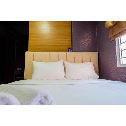 Compact and Comfy 2BR Bassura City Apartment By Travelio