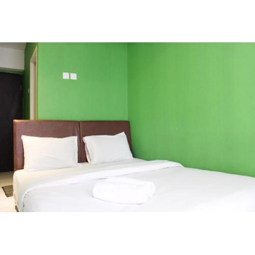 Compact Studio Room The Jarrdin Cihampelas Apartment By Travelio