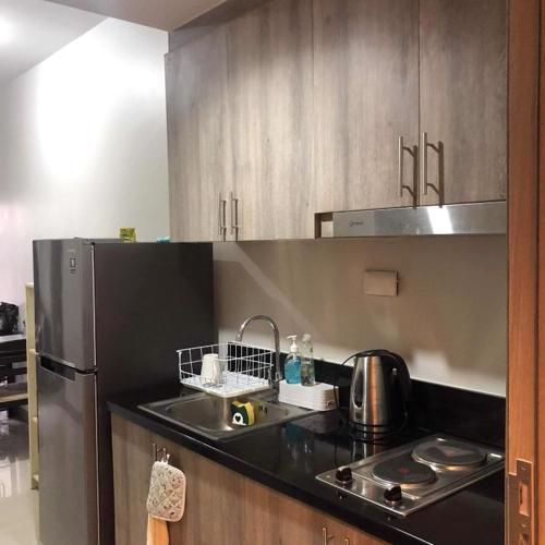 CONDO staycation Near Mall Of Asia