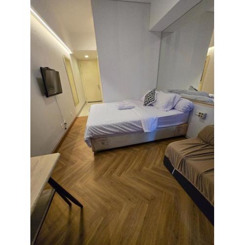 Cosmy Benson 38 Apartment