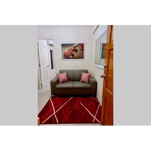 Cosy 1-bedroom condo in vibrant Malabanias