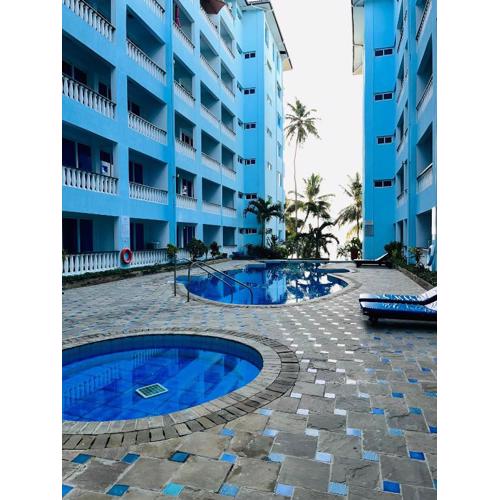 Cowrie Shell Beach Apartments Official