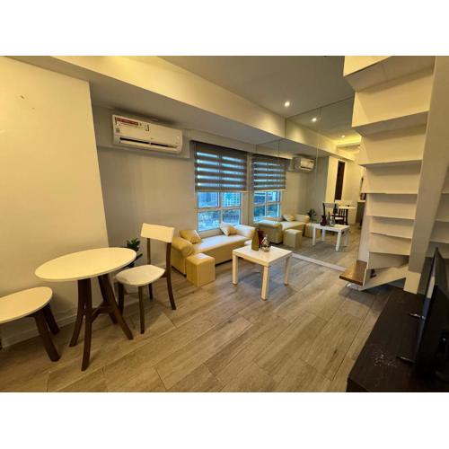 Cozi Modern Loft Suite near high street BGC wifi pool
