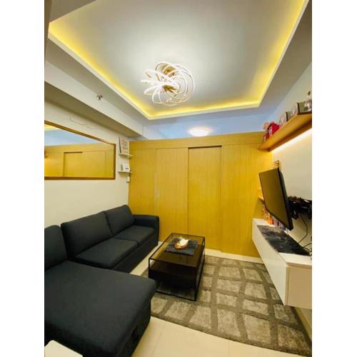 cozy 1 br with netflix and wifi at Grass residences