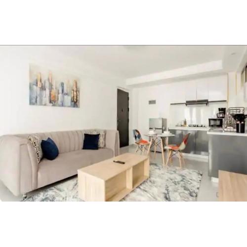 Cozy 1Bdr with gym and golf simulator ,Yaya center