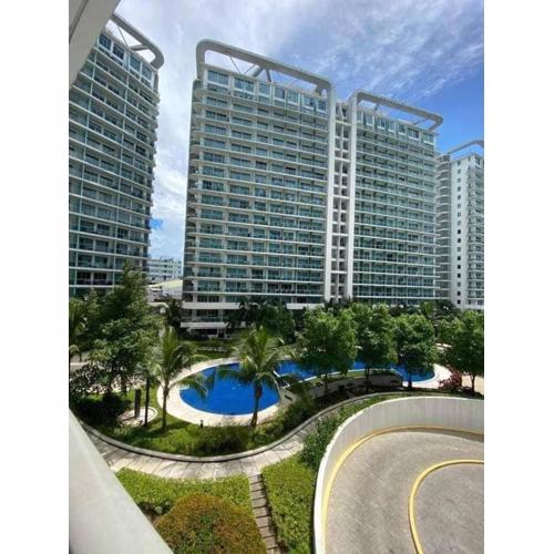 Cozy 1BR cityview with Balcony and near Airport