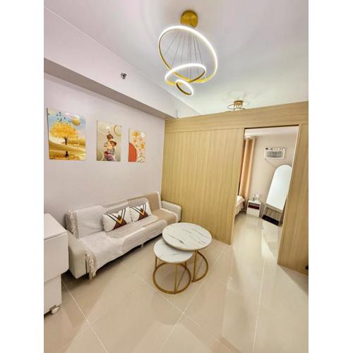 Cozy 1BR Condo at Grass Residences near SM North