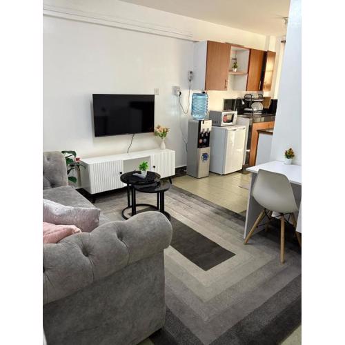 Cozy 1BR with Kitchen Balcony and Wi-Fi near CBD