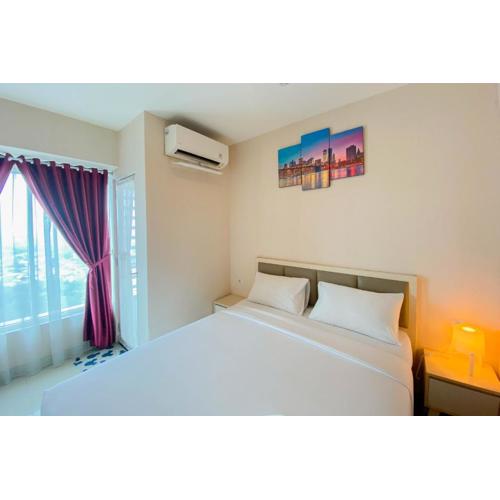 Cozy 1BR without Living Room Grand Kamala Lagoon Apartment By Travelio