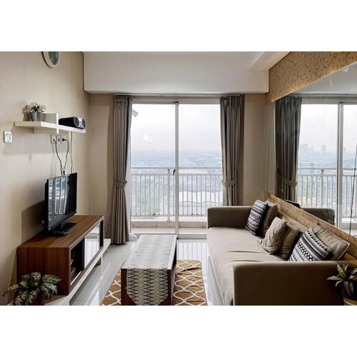 Cozy 2BR Apt Trivium Cikarang with Pool, Gym, WiFi by 2ndHome