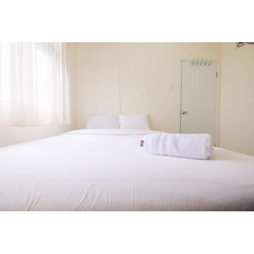 Cozy 2BR at 28th Floor Green Pramuka City Apartment By Travelio