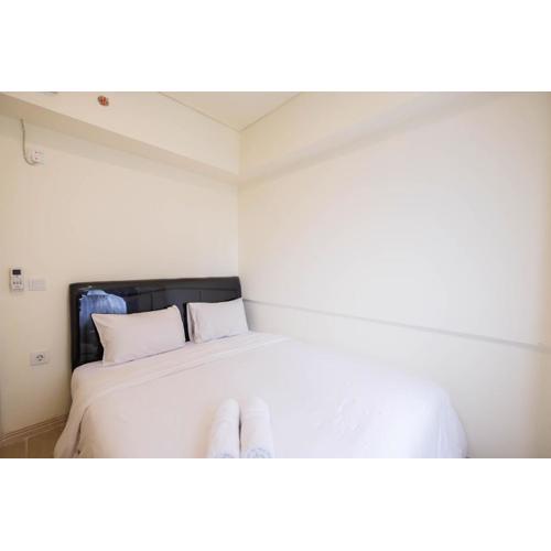 Cozy 2BR at Meikarta Apartment By Travelio