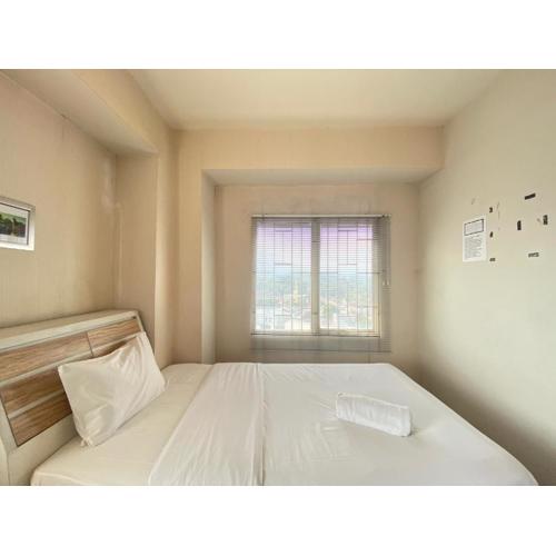 Cozy 2BR at Pinewood Apartment By Travelio