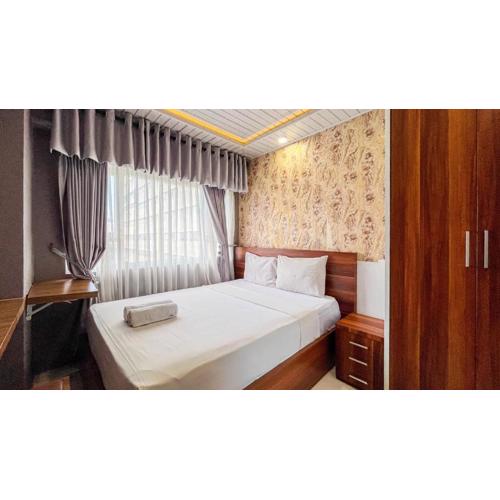 Cozy 2BR at Royal Makassar Apartment By Travelio