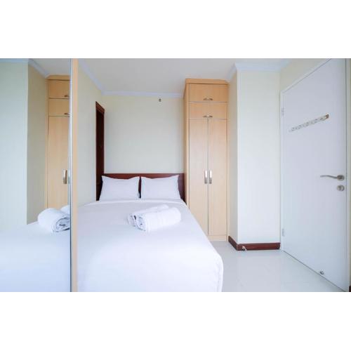 Cozy 2BR Bassura City Apartment By Travelio