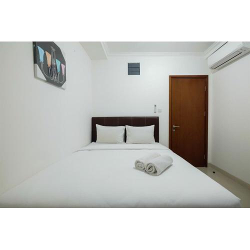 Cozy 2BR Signature Park Grande MT Haryono By Travelio