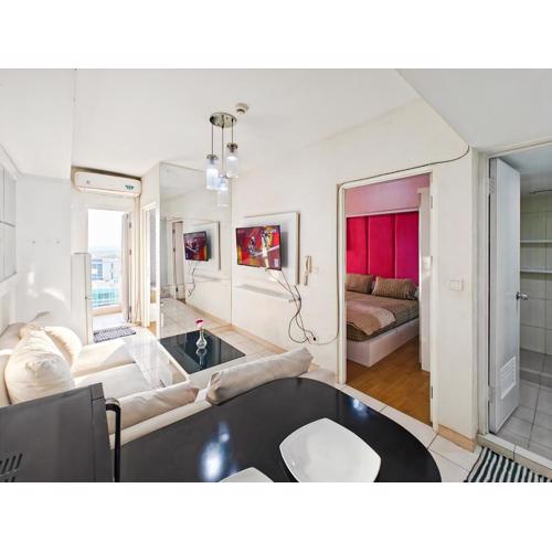 Cozy 2BR Springlake Apt Bekasi with Pool & Gym by 2ndHome