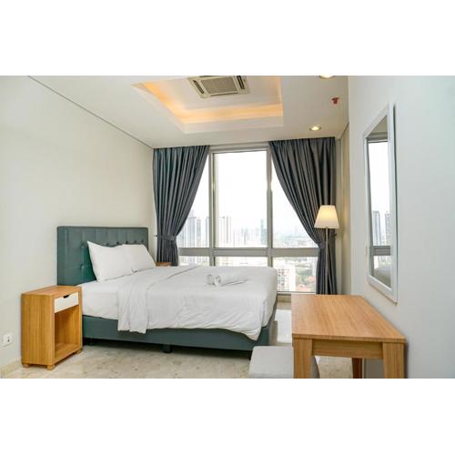 Cozy 2BR @ The Masterpiece Condominium Epicentrum Apartment By Travelio