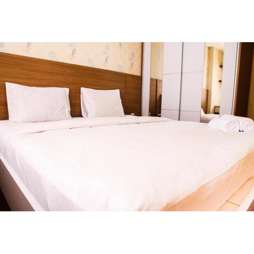 Cozy and Elegant 1BR Apartment Belmont Residence Puri By Travelio