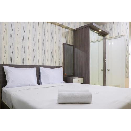 Cozy and Enjoy Studio Room at Green Pramuka City Apartment By Travelio