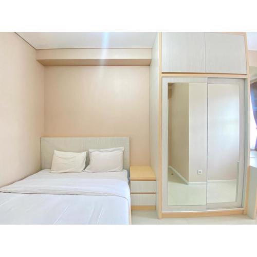 Cozy and Minimalist 2BR Apartment at Parahyangan Residence By Travelio