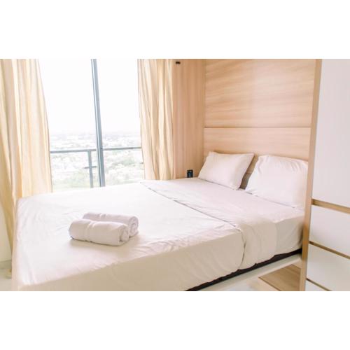 Cozy and Minimalist Studio at Sky House BSD Apartment By Travelio