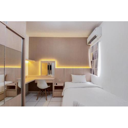 Cozy and Minimalist Studio (No Kitchen) at Aeropolis Apartment By Travelio