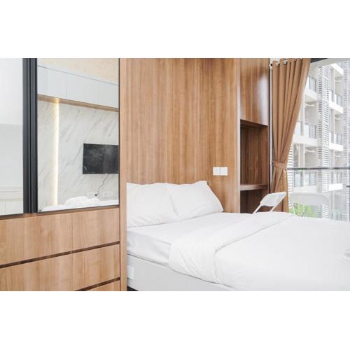 Cozy and Minimalist Studio Room at Sky House BSD Apartment By Travelio