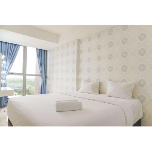 Cozy and Modern Look 1BR Gold Coast Apartment By Travelio