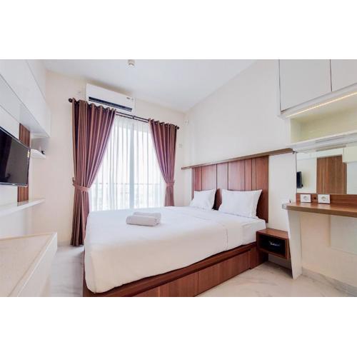 Cozy and Nice Studio Apartment at Sky House BSD By Travelio