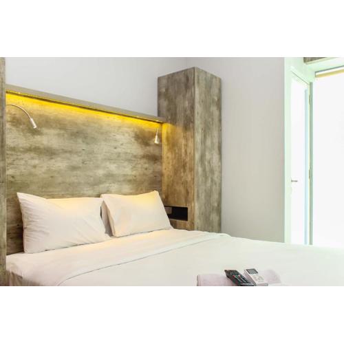 Cozy and Nice Studio at Grand Kamala Lagoon Apartment By Travelio