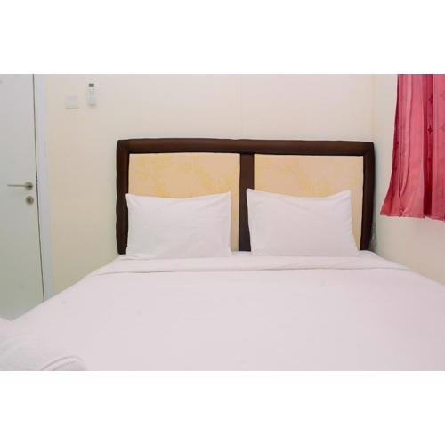 Cozy and Relax 2BR Green Pramuka City Apartment By Travelio
