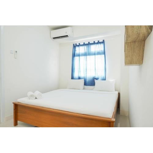 Cozy and Simply 1BR Green Pramuka Apartment By Travelio