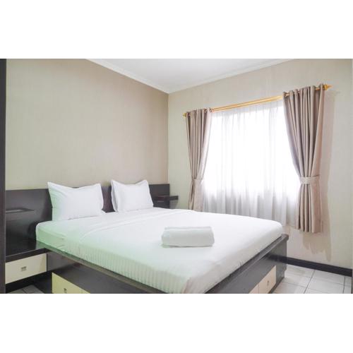 Cozy and Simply Look 2BR at 12nd Floor Puri Garden Apartment By Travelio