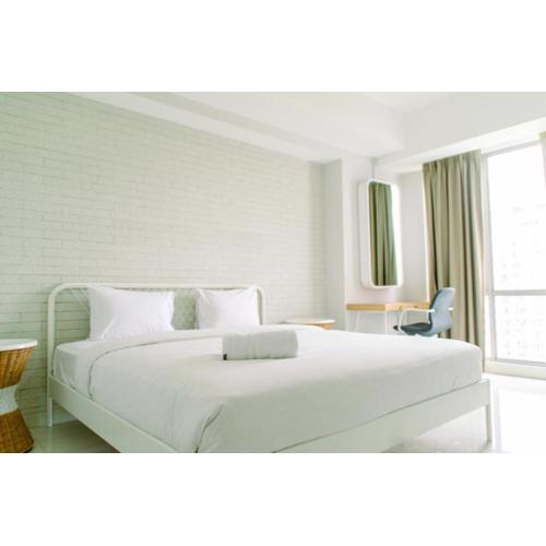 Cozy and Spacious 2BR The Mansion Kemayoran Apartment near JIEXPO By Travelio