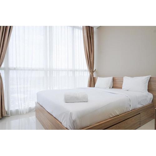 Cozy and Wonderful 1BR Ciputra International Apartment By Travelio