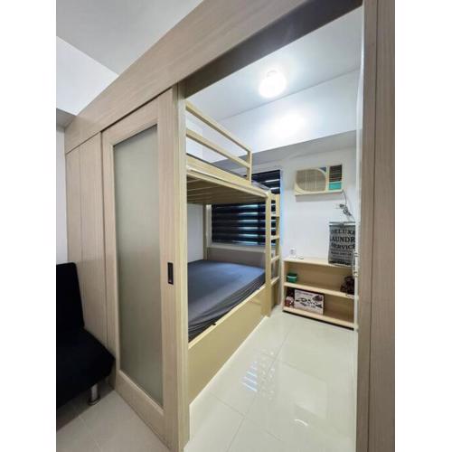 Cozy condo by the MRT & Light Mall experience comfort and convenience