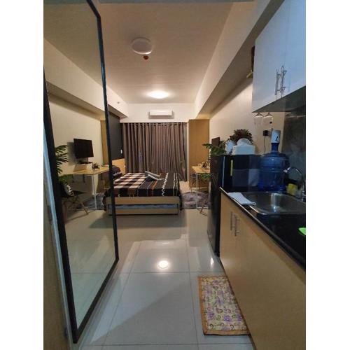 Cozy Condo Studio with Balcony Amenities View at SM North Edsa