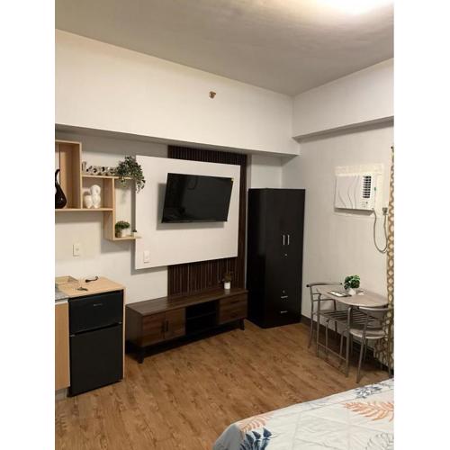 Cozy condo unit at Amani Grand near Cebu Airport