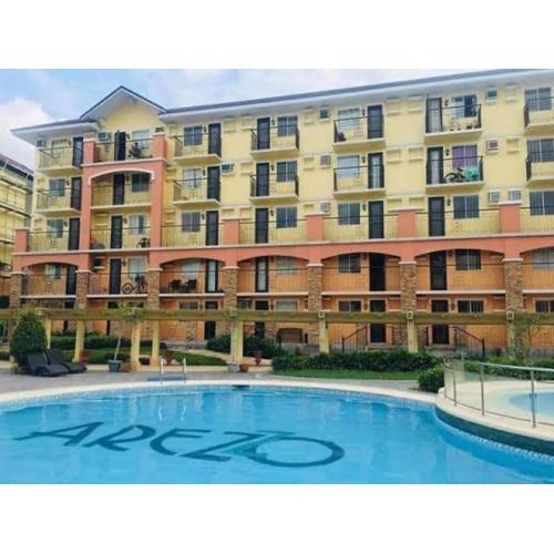 Cozy Condo with Swimming Pool, WIFI & Netflix good for 4PAX