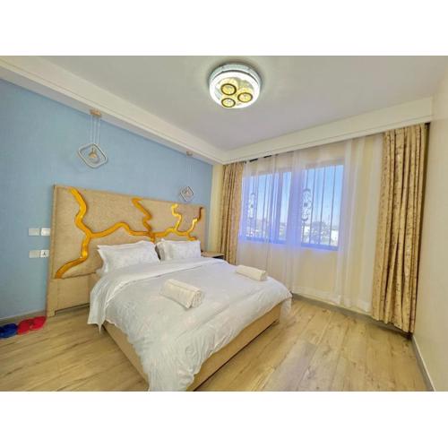 cozy corner two bedroom apartment with fully equipped gym heated swimming pool ample parking space and proximity to major shopping malls