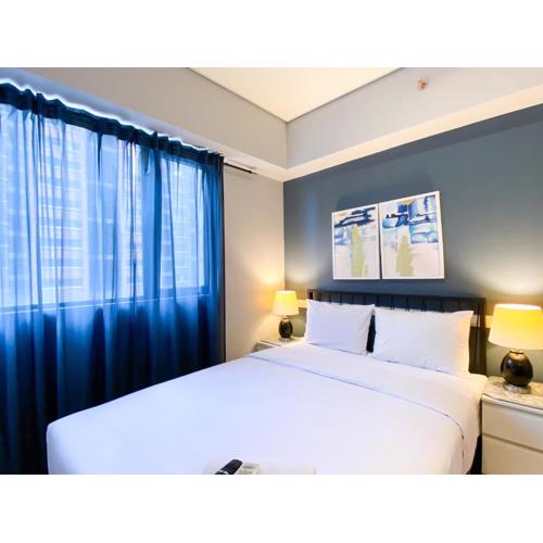 Cozy Designed 2BR with Working Room at Meikarta Apartment By Travelio