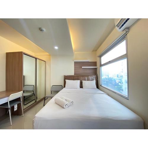 Cozy Designed Studio Apartment at Grand Asia Afrika By Travelio