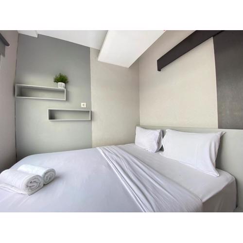 Cozy Furnished 2BR Apartment at Grand Asia Afrika By Travelio