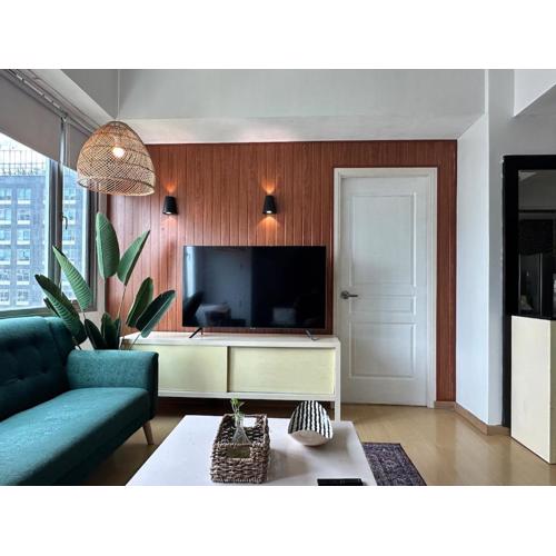 Cozy House BGC 1BR up to 6 Guests 100MBPS WiFi