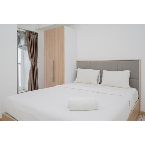 Cozy Living 2BR at M-Town Residence Apartment By Travelio